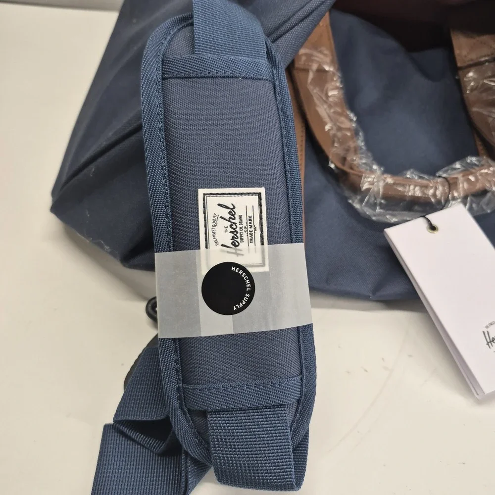 Herschel Novel Duffle Bag Navy Tan Retail: $120